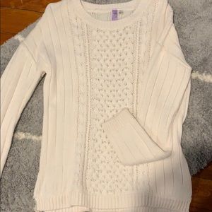 White sweater with pearls on the front